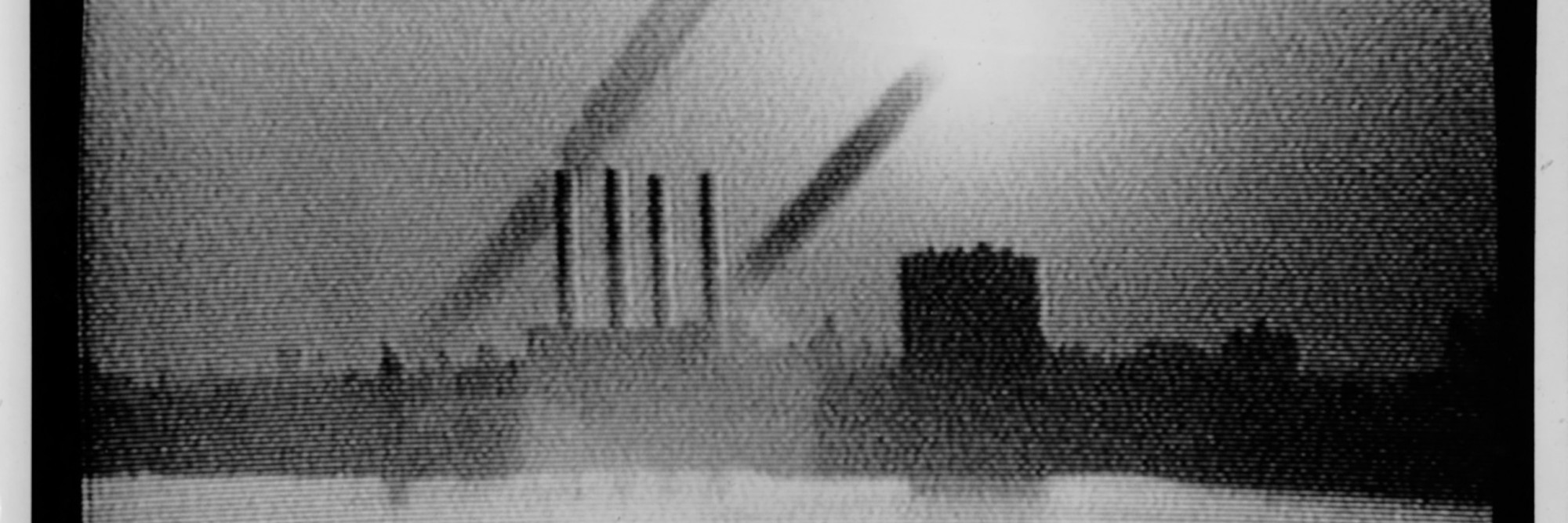 Mary Lucier. Dawn Burn (detail). 1975. Seven monitors of increasing sizes from 15 to 25 inches diagonal; slide projector mounted on wall; seven-channel video converted from ½-inch, open-reel tape to DigiBeta and DVD (black and white, silent); one color slide (34:00 min., continuous). Structure: 7’3”–8’ 2” x 20’ (approx.) x 20”–27”. Collection San Francisco Museum of Modern Art.Accessions Committee Fund: gift of Doris and Donald Fisher, Marion E. Greene, Evelyn and Walter Haas, Jr., and Leanne B. Roberts, 1991. © 2011 Mary Lucier
