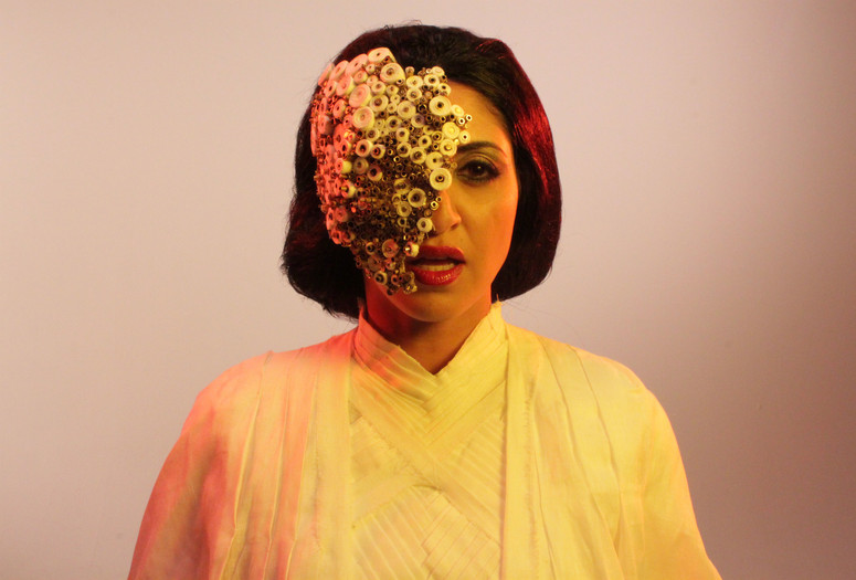 MASK played by Houda Echouafni, production still from Piercing Brightness. Directed by Shezad Dawood. 2013. Courtesy of UBIK Productions Ltd. Photograph by Richard Harrowing