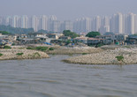 MAP Office Lau Fan Shan oyster farm in the shadows of Tin Shui Wai New Town, Hong Kong. 2014. © Map Office