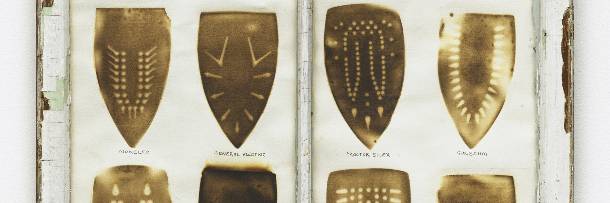 Willie Cole. Domestic I.D. IV. 1992. Iron scorches and pencil on paper mounted in recycled painted wooden window frame, 35 × 32 × 1 1/8″ (88.9 × 81.3 × 3.4 cm). The Museum of Modern Art, New York. Purchased with funds given by Agnes Gund