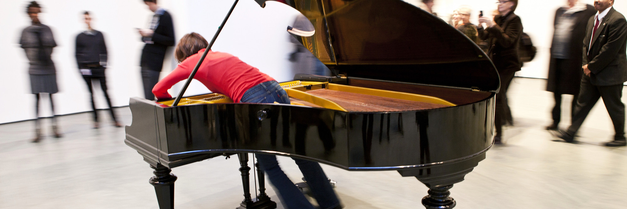 Jennifer Allora and Guillermo Calzadilla. Stop, Repair, Prepare: Variations on “Ode to Joy” for a Prepared Piano. 2008. Prepared Bechstein piano, pianist (Terezija Cukrov shown). Piano: 40 x 67 x 84" (101.6 x 170.2 x 213.4 cm). The Museum of Modern Art. Gift of the Julia Stoschek Foundation, Düsseldorf. © 2011 Yi-Chun Wu/The Museum of Modern Art