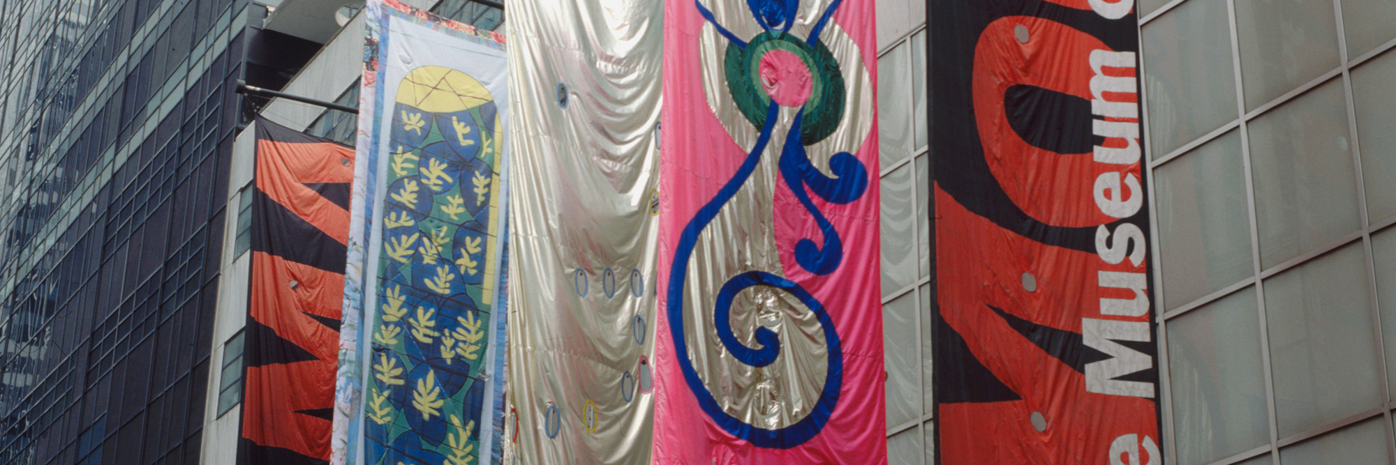 Installation view of Projects 70: Jim Hodges, Beatriz Milhazes, Faith Ringgold (Banners, Series 2) at The Museum of Modern Art, New York
