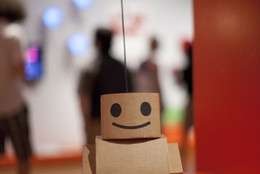 Kacie Kinzer. Interactive Telecommunications Program, Tisch School of the Arts, New York University. Tweenbot. 2009. Cardboard, paper, ink, batteries, motor, and wheels, 36 x 8 1/2 x 14" (91.4 x 21.6 x 35.6 cm). Installation view at The Museum of Modern Art, 2011. Photo © Scott Rudd