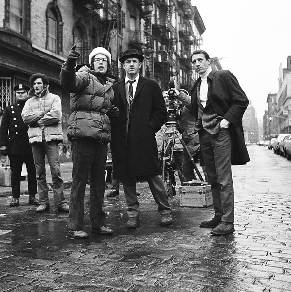 Director William Friedkin on the set of The French Connection with Gene Hackman and Roy Scheider. The French Connection. 1971. USA. Directed by William Friedkin