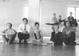 Rehearsal at Merce Cunningham's studio, 1964. Left to right, seated: Barbara Dilley Lloyd, John Cage, Sandra Neels, Shareen Blair, and Robert Rauschenberg. Left to right, standing: MC, Carolyn Brown, Steve Paxton, William David, and Viola Farber. Photo: Robert Rauschenberg © Robert Rauschenberg Foundation