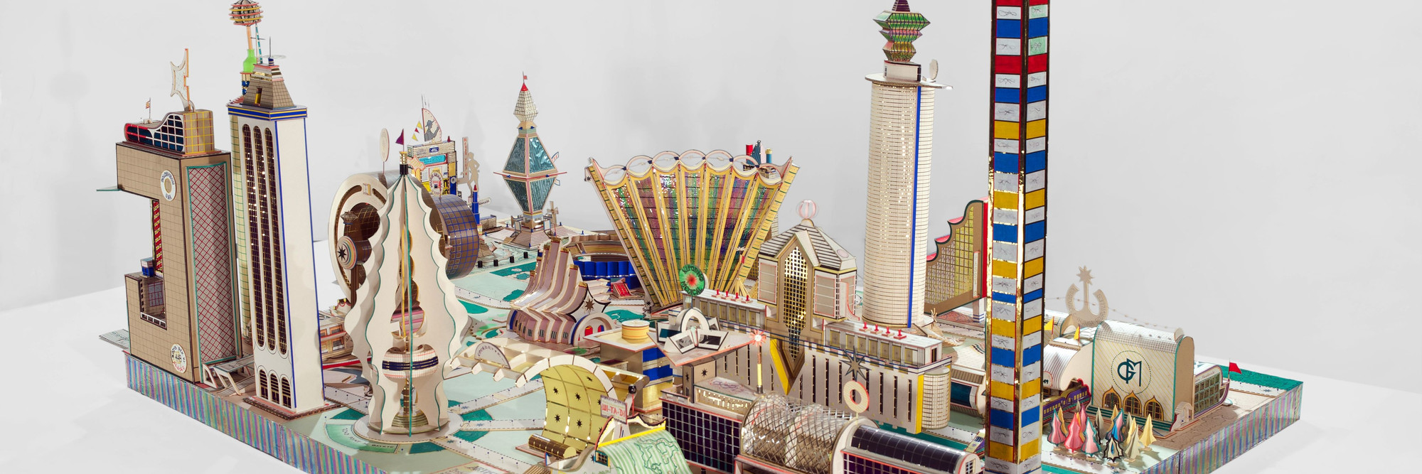 Bodys Isek Kingelez. Kimbembele Ihunga. 1994. Paper, cardboard, polystyrene, mixed media, 51 3/16 × 72 13/16 × 126" (130 × 185 × 320 cm). CAAC - The Pigozzi Collection, Geneva. © Bodys Isek Kingelez. Photo: Maurice Aeschimann. Courtesy CAAC - The Pigozzi Collection