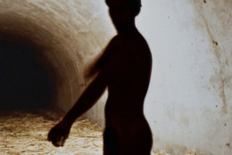 Tania Bruguera. Untitled (Havana, 2000), 2000. Sugar cane bagasse, video (black and white, silent; 4:37 min.), and live performance. Dimensions variable. The Museum of Modern Art, New York.The Modern Women's Fund and Committee on Media and Performance Art Funds. © 2018 Tania Bruguera. Installation view, Uno más cerca del otro, VII Bienal de La Habana. Fortaleza de San Carlos de la Cabaña, Galería de Contraminas de San Ambrosio, Havana (November 17, 2000). Image courtesy the artist. Photo: Casey Stoll.