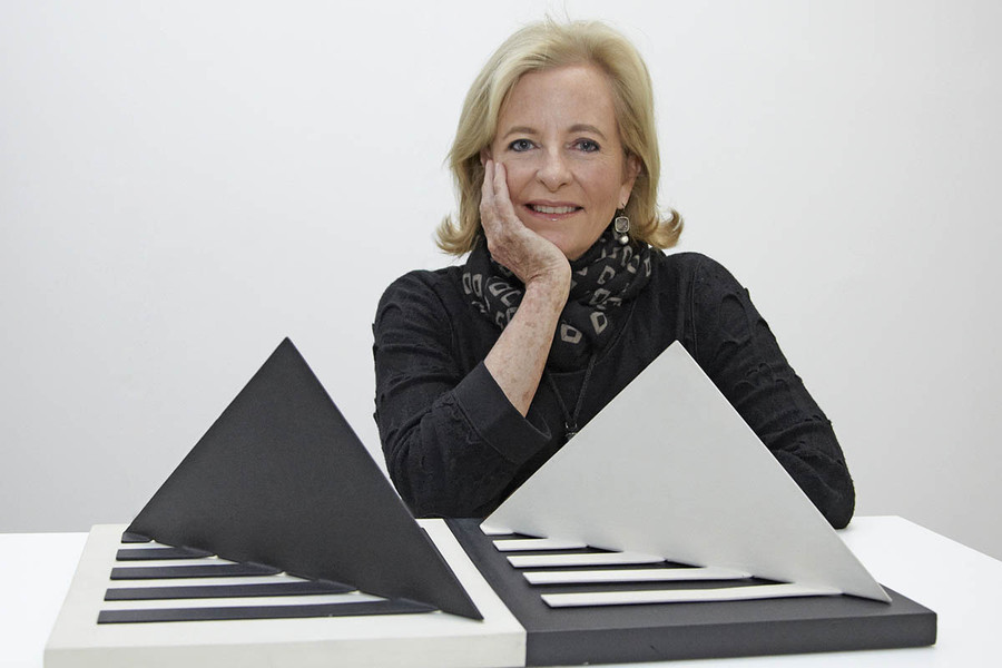 Patricia Phelps de Cisneros. Photo: Timothy Greenfield-Sanders. Artwork shown: Luiz Sacilotto. Concretion 58. 1958. Enamel on metal and acrylic over wood, 7 7/8 × 23 5/8 × 12" (20 × 60 × 30.5 cm). Promised gift of Patricia Phelps de Cisneros through the Latin American and Caribbean Fund in honor of Rodrigo Cisneros-Santiago