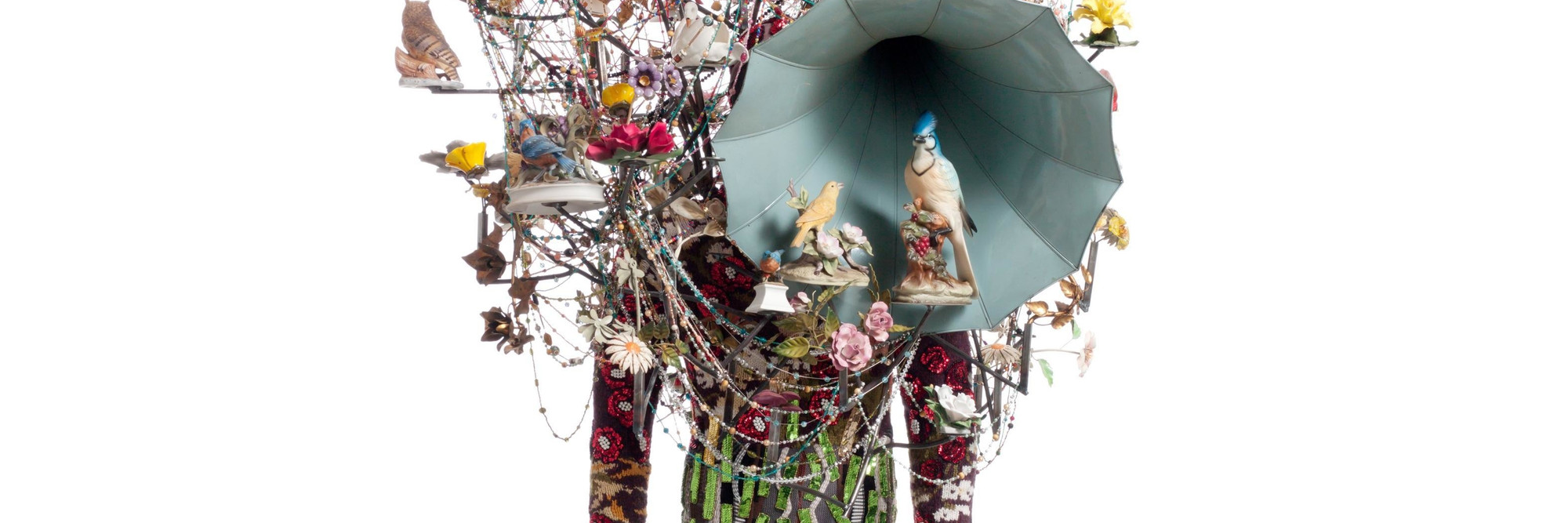 Nick Cave. Soundsuit. 2011. Found objects, knit head and bodysuit, and mannequin, 10' 1" x 42" x 33" (307.3 x 106.7 x 83.8 cm). The Museum of Modern Art, New York. Gift of Agnes Gund in honor of Dr. Stuart W. Lewis. © 2018 Nick Cave. Photo: Imaging and Visual Resources Department, MoMA