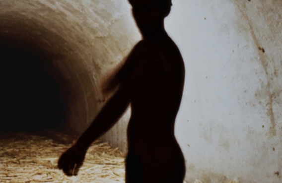 Tania Bruguera. Untitled (Havana, 2000), 2000. Sugar cane bagasse, video (black and white, silent; 4:37 min.), and live performance. Dimensions variable. The Museum of Modern Art, New York.The Modern Women's Fund and Committee on Media and Performance Art Funds. © 2018 Tania Bruguera. Installation view, Uno más cerca del otro, VII Bienal de La Habana. Fortaleza de San Carlos de la Cabaña, Galería de Contraminas de San Ambrosio, Havana (November 17, 2000). Image courtesy the artist. Photo: Casey Stoll.