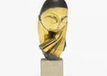 Constantin Brancusi. Mlle Pogany. Version I, 1913 (after a marble of 1912). Bronze with black patina, 17 1/4 x 8 1/2 x 12 1/2" (43.8 x 21.5 x 31.7 cm), on limestone base, 5 3/4 x 6 1/8 x 7 3/8" (14.6 x 15.6 x 18.7 cm). Acquired through the Lillie P. Bliss Bequest (by exchange). © 2018 Artists Rights Society (ARS), New York/ADAGP, Paris
