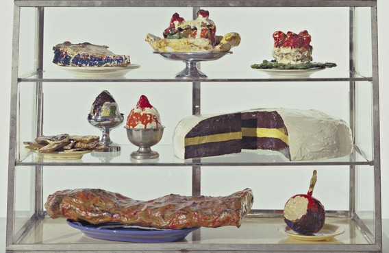 Pastry Case, I Date: 1961-62 Medium: Burlap and muslin soaked in plaster, painted with enamel, metal bowls, and ceramic plates in glass-and-metal case Dimensions: 20 3/4 x 30 1/8 x 14 3/4" (52.7 x 76.5 x 37.3 cm) Credit Line: The Sidney and Harriet Janis Collection MoMA Number: 639.1967.a-dd