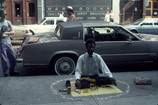 Pope.L (American, born 1955). Thunderbird Immolation a.k.a. Meditation Square Piece, West Broadway, New York. 1978. Inkjet print, 10 × 15" (25.4 × 38.1 cm). The Museum of Modern Art, New York. Acquired in part through the generosity of Jill and Peter Kraus, Anne and Joel S. Ehrenkranz, The Contemporary Arts Council of The Museum of Modern Art, The Jill and Peter Kraus Media and Performance Acquisition Fund, and Jill and Peter Kraus in honor of Michael Lynne. © Pope.L, courtesy the artist