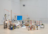 Sarah Sze. Triple Point (Pendulum). 2013. Salt, water, stone, string, projector, video, pendulum, and other materials, dimensions variable, approximately 150 × 210 × 200" (381 × 533.4 × 508 cm). Gift of the International Council of The Museum of Modern Art, Agnes Gund, Ronald S. and Jo Carole Lauder, and Sharon Percy Rockefeller, in honor of the 60th Anniversary of the International Council