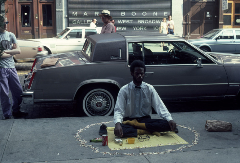 Pope. L. Thunderbird Immolation a.k.a Meditation Square Pieces. New York, NY 1978. Digital c-print on gold fiber silk paper. 9 x 6 in. 22.86 x 15.24 cm. © Pope. L. Courtesy of the artist and Mitchell – Innes &amp; Nash, New York