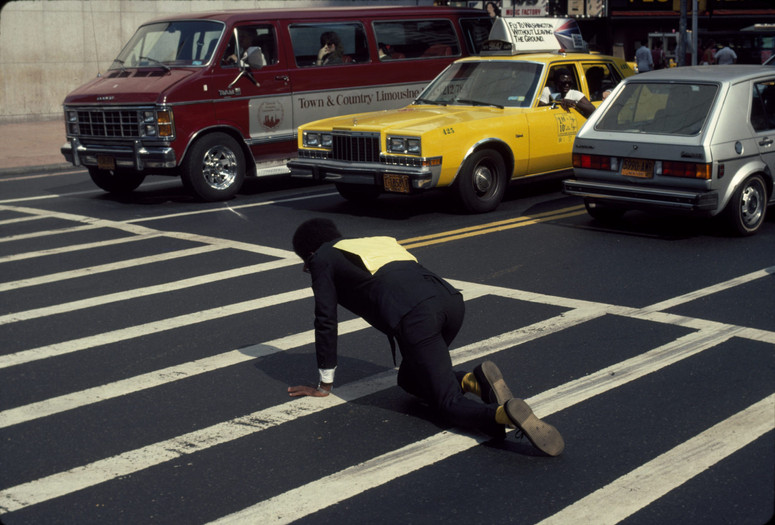 Pope. L. Times Square Crawl a.k.a Meditation Square Pieces. 1978. New York. Digital c-print on gold fiber silk paper. 10 x 15 in. 25.4 x 38.1 cm. © Pope.L. Courtesy of the artist and Mitchell – Innes &amp; Nash, New York