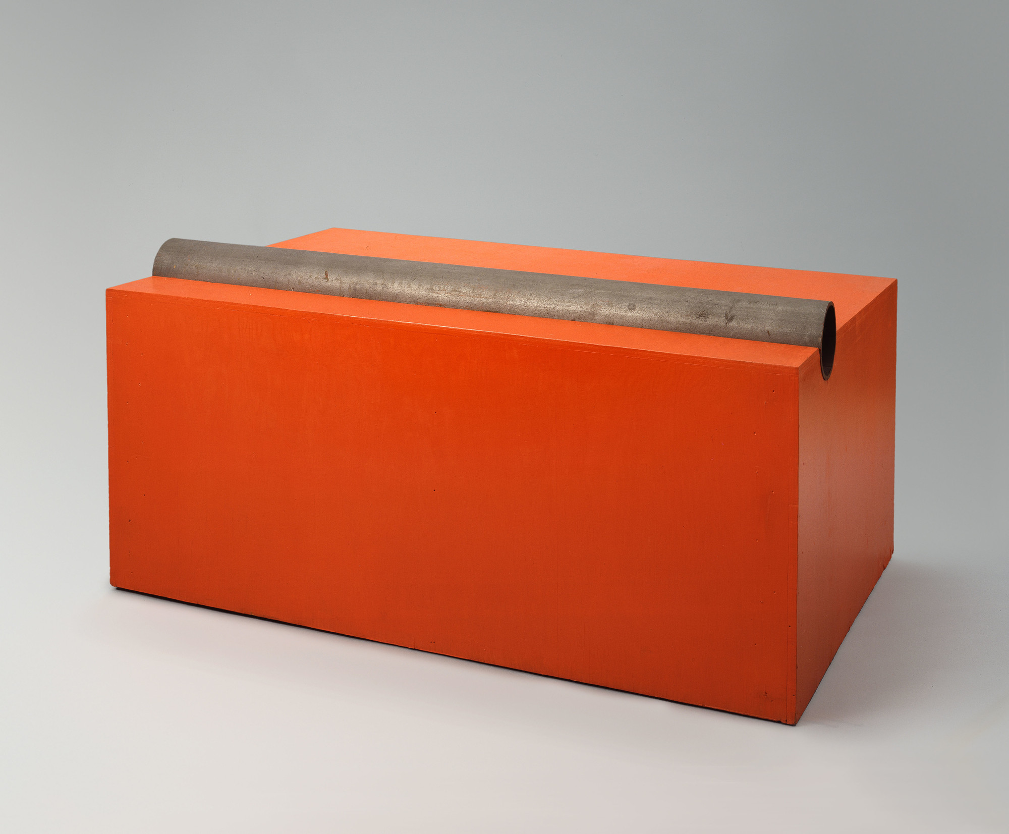 Donald Judd_Untitled_. 1963. Cadmium red light oil on wood with iron pipe.  22 1 × 45 3 × 30 ½" (56.2 × 115.3 × 77.5 cm) . Hirshhorn Museum and Sculpture Garden, Smithsonian Institution, Washington, DC. Joseph H. Hirshhorn Purchase Fund, 1991. © 2020 Judd Foundation / Artists Rights Society (ARS), New York
