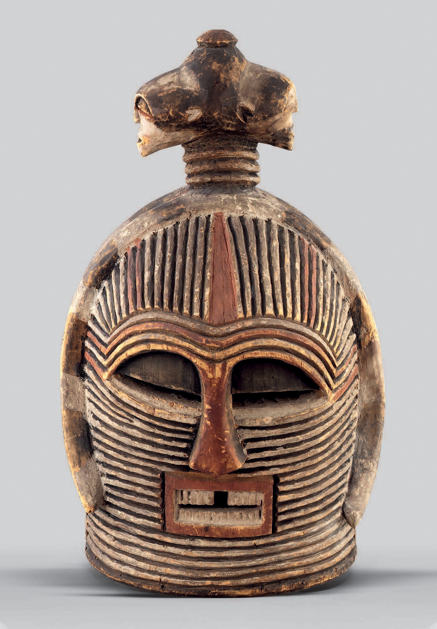 Unrecorded artist, Songye peoples, Democratic Republic of the Congo. _Mask_. 19th–early 20th century. Polychrome wood. 18 7/8 × 11 × 12 5/8" (48 × 28 × 32 cm). Musée d’Art Moderne de la Ville de Paris. Bequest of Dr. Maurice Girardin, 1953. © Musée d'Art Moderne / Roger-Viollet: Photo Eric Emo