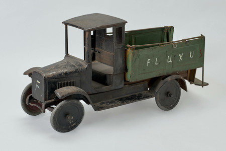 Nam June Paik. 3 F Truck. 1977. Toy truck with paint additions, 12 3/8 x 24 x 8 7/16" (31.5 x 61 x 21.5 cm). The Gilbert and Lila Silverman Fluxus Collection Gift. © 2020 Nam June Paik. Photo: Robert Gerhardt