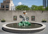 View of the PS1 Courtyard. Shown: Niki de Saint Phalle. La femme et L'oiseau fontaine. 1967. Painted polyester resin. Courtesy Galerie Mitterrand, Paris; Galerie GP &amp; N Vallois, Paris; and Salon 94, New York; Raúl de Nieves. The Stories of the Past Rejoice through Children's Skies. 2021. Courtesy the artist and Company Gallery, New York. Photo: Kris Graves