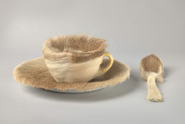 Meret Oppenheim. Object. 1936. Fur-covered cup, saucer, and spoon; cup 4 3/8" (10.9 cm) in diameter; saucer 9 3/8" (23.7 cm) in diameter; spoon 8" (20.2 cm) long, overall height 2 7/8" (7.3 cm). Purchase. © 2021 Artists Rights Society (ARS), New York/Pro Litteris, Zurich