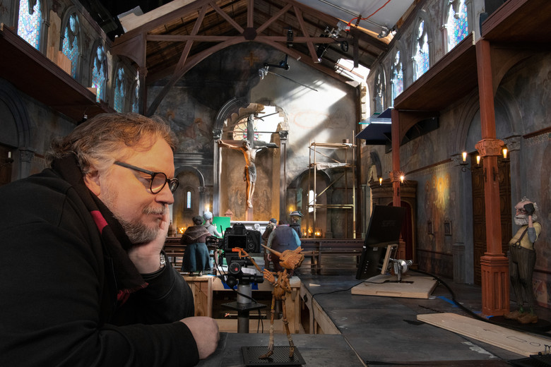 Guillermo del Toro on the set of Guillermo del Toro's Pinocchio, 2022. Image courtesy Jason Schmidt/Netflix