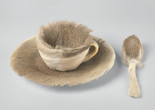 Meret Oppenheim. Object (Objet). 1936. Fur-covered cup, saucer, and spoon; cup 4 3/8″ (10.9 cm) in diameter; saucer 9 3/8″ (23.7 cm) in diameter; spoon 8″ (20.2 cm) long, overall height 2 7/8″ (7.3 cm). The Museum of Modern Art, New York. Purchase