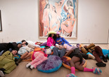 Night Night at the Museum with Black Power Naps. The Museum of Modern Art, New York, January 20, 2023. Photo: Julieta Cervantes. Digital image ©️ 2023 The Museum of Modern Art. Shown: Pablo Picasso. Les Demoiselles d’Avignon. 1907. Oil on canvas, 8' × 7' 8" (243.9 × 233.7 cm). The Museum of Modern Art. Acquired through the Lillie P. Bliss Bequest (by exchange). ©️ 2023 Estate of Pablo Picasso/Artists Rights Society (ARS), New York