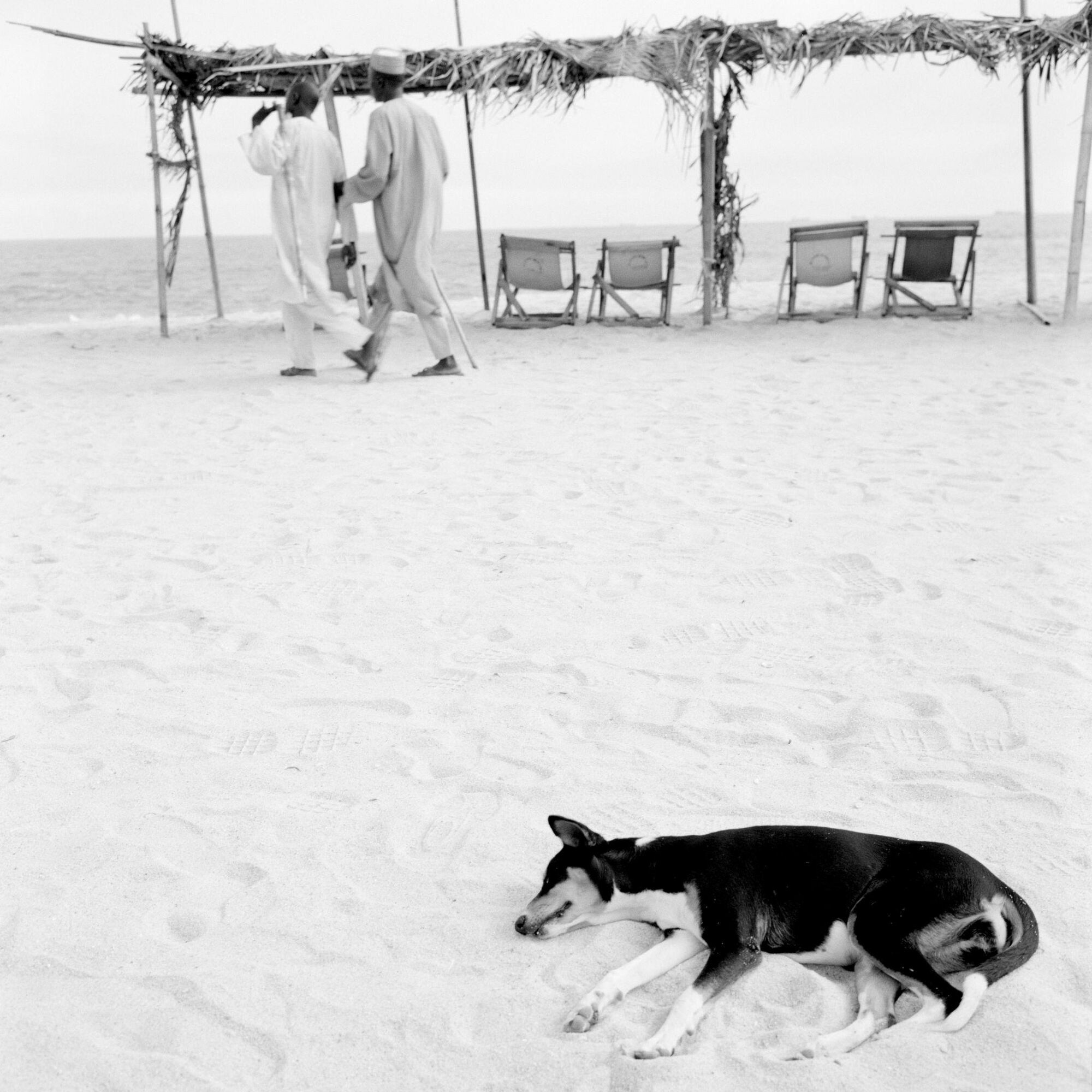 Akinbode Akinbiyi. *Bar Beach, Victoria Island, Lagos* from the series Sea Never Dry. 2003. Gelatin silver print, sheet: 23 5/8 × 23 5/8" (60 × 60 cm). Courtesy of the artist. © Akinbode Akinbiyi