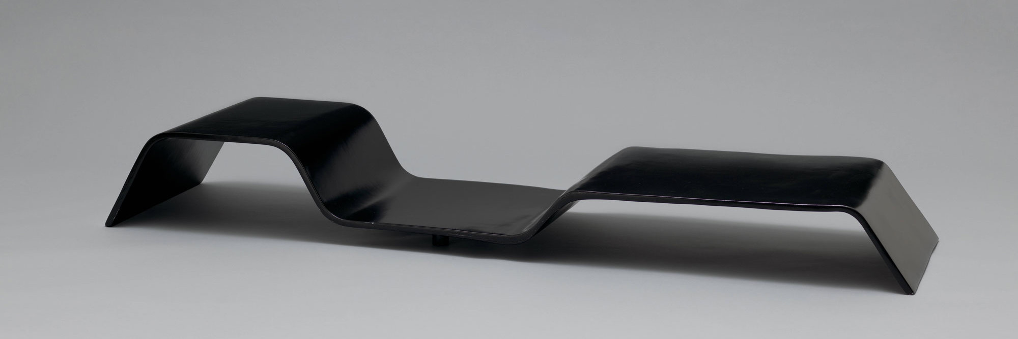 Oscar Niemeyer. “Modulo” Low Table. 1978. Painted plywood and steel, 9 1/2 × 75 3/4 × 19 3/4" (24.1 × 192.4 × 50.2 cm). The Museum of Modern Art, New York. Committee on Architecture and Design Funds
