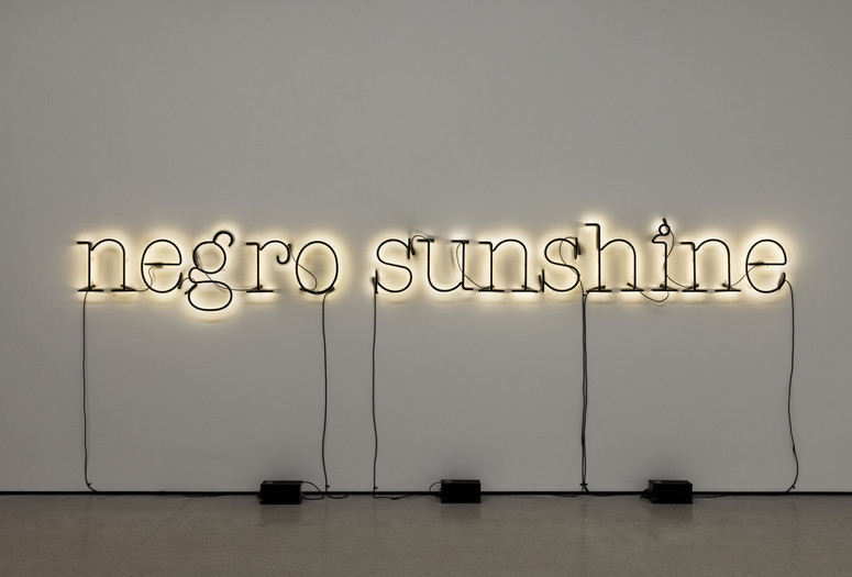 Glenn Ligon. Warm Broad Glow. 2005. Neon and blackout paint, 26" × 16' (66 × 487.7 cm). Bequest of Janice H. Levin (by exchange). © 2024 Glenn Ligon