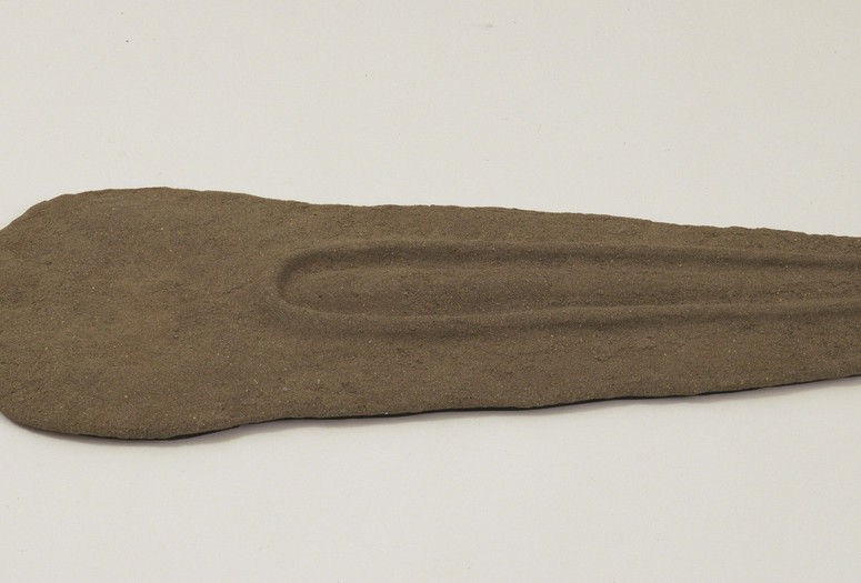 Ana Mendieta. Nile Born. 1984. Sand and binder on wood, 2 3/4 × 19 1/4 × 61 1/2" (7 × 48.9 × 156.2 cm). Gift of Agnes Gund. © 2024 Estate of Ana Mendieta Collection
