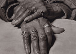 LaToya Ruby Frazier. Marilyn Moore, UAW Local 1112, Women’s Committee and Retiree Executive Board, with her General Motors company retirement gold ring on her index finger, (Youngstown Sheet &amp; Tube Co., Lear Seating Corp., 32 years in at GM Lordstown Complex, assembly plant, van plant, metal fab, trim shop), Youngstown, OH, 2019 from The Last Cruze. 2019. Gelatin silver print, 70 × 57" (177.8 × 144.8 cm). The Museum of Modern Art, New York. Acquired with the generous support of the Fund for the Twenty-First Century; Vital Projects Fund, Robert B. Menschel; Jon Stryker and Slobodan Randjelović; Clarissa A. Bronfman; Ian Cook; David Dechman and Michel Mercure; Thomas and Susan Dunn; Kristy and Robert Harteveldt; Mark Levine; Heidi and Richard Rieger; Christine A. Symchych and James P. McNulty, and Clark B. Winter Jr. © 2024 LaToya Ruby Frazier