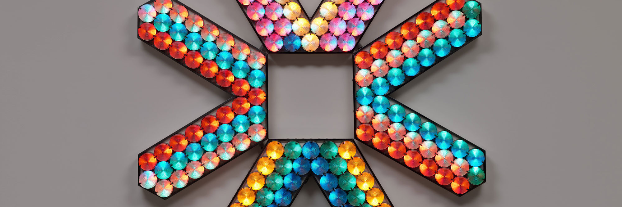 Tom Lloyd. Veleuro. 1968. Light bulbs, plastic lenses, aluminum, laminated plywood, analog sequencer transferred to digital, four units, overall dimensions 68 × 68 × 7 1/2" (172.7 × 172.7 × 19.1 cm). The Museum of Modern Art, New York. Gift of Adam Bartos