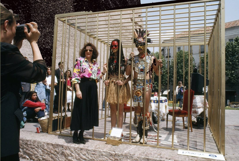 Coco Fusco and Paula Heredia. The Couple in the Cage: Guatinaui Odyssey. 1993. Standard-definition video (black and white and color, sound). 31 min. The Museum of Modern Art, New York. Gift of Mario Cader-Frech through the Latin American and Caribbean Fund. © 2025 Coco Fusco and Paula Heredia. Courtesy Video Data Bank, School of the Art Institute of Chicago.