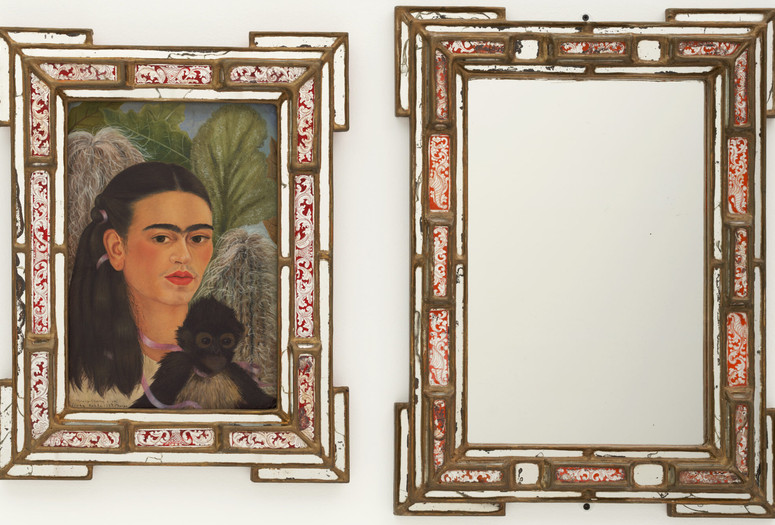 Frida Kahlo. Fulang-Chang and I. 1937 (assembled after 1939). In two parts, oil on board (1937) with painted mirror frame (added after 1939); and mirror with painted mirror frame (after 1939), Framed painting; framed mirror. The Museum of Modern Art, New York. Mary Sklar Bequest. © 2026 Banco de México Diego Rivera Frida Kahlo Museums Trust, Mexico, D.F. / Artists Rights Society (ARS), New York