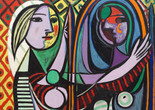 Pablo Picasso. Girl Before a Mirror. 1932. Oil on canvas. 64 x 51 1/4" (162.3 x 130.2 cm). Gift of Mrs. Simon Guggenheim. © 2026 Estate of Pablo Picasso / Artists Rights Society (ARS), New York. A colorful Cubist painting of a girl looking into a mirror. The composition is defined by bold black outlines, rich primary colors, and intricate diamond-patterned backgrounds that merge the figure with her environment.