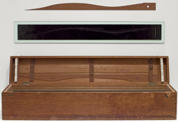 Marcel Duchamp. 3 Standard Stoppages. 1913–14. Wood box 11 1/8 x 50 7/8 x 9" (28.2 x 129.2 x 22.7 cm), with three threads 39 3/8" (100 cm), glued to three painted canvas strips 5 1/4 x 47 1/4" (13.3 x 120 cm), each mounted on a glass panel 7 1/4 x 49 3/8 x 1/4" (18.4 x 125.4 x 0.6 cm), three wood slats 2 1/2 x 43 x 1/8" (6.2 x 109.2 x 0.2 cm), shaped along one edge to match the curves of the threads. The Museum of Modern Art, New York. Katherine S. Dreier Bequest. © 2026 Artists Rights Society (ARS), New York / ADAGP, Paris / Estate of Marcel Duchamp