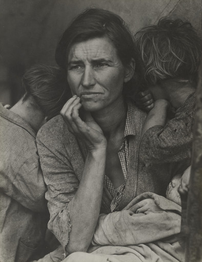 A person with weathered skin is seated with a pensive expression, resting their hand on their face. Two children with unkempt hair are leaning against them, and a baby is cradled in their lap. This is an AI generated description. To give feedback, email ai@moma.org.