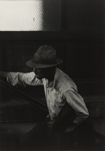 Roy DeCarava. Man Coming Up Subway Stairs. 1952