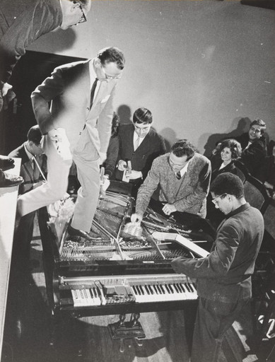 Philip Corner, Emmett Williams, George Maciunas, Benjamin Patterson, Dick Higgins, Alison Knowles. Philip Corner's Piano Activities, performed by Philip Corner, George Maciunas, Emmett Williams, Benjamin Patterson, Dick Higgins, and Alison Knowles during Fluxus Internationale Festspiele Neuester Musik, Hörsaal des Städtischen Museums, Wiesbaden, Germany, September 1, 1962. 1962