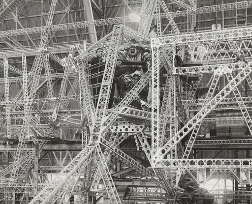 Times Wide World Photos. "The Motive Power To Drive a Giant of the Air Through the Clouds". 1931