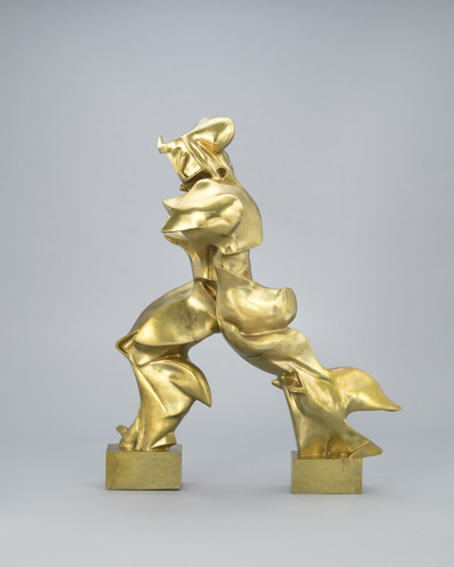 Golden metallic sculpture depicting an abstract, dynamic figure in motion, set against a light gray background. The form is fluid, with curved and angular shapes. This is an AI generated description. To give feedback, email ai@moma.org.