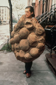 Louise Bourgeois. Louise Bourgeois in 1975 wearing her latex sculpture Avenza (1968-1969) which became part of Confrontation (1978). 1975